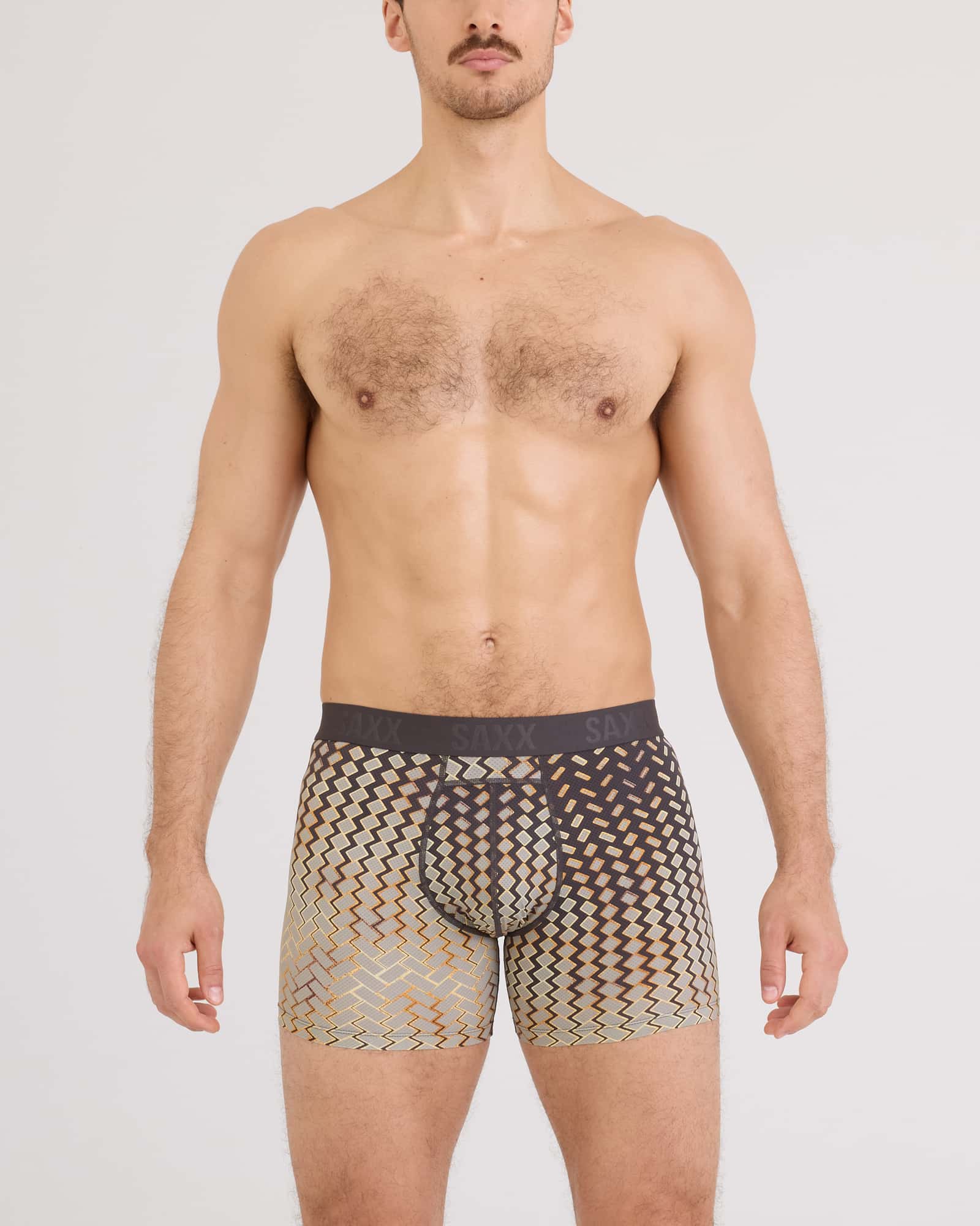 Front - Model wearing Smooth Flex Light Compression Boxer Brief in Lustre Weave-Faded Black