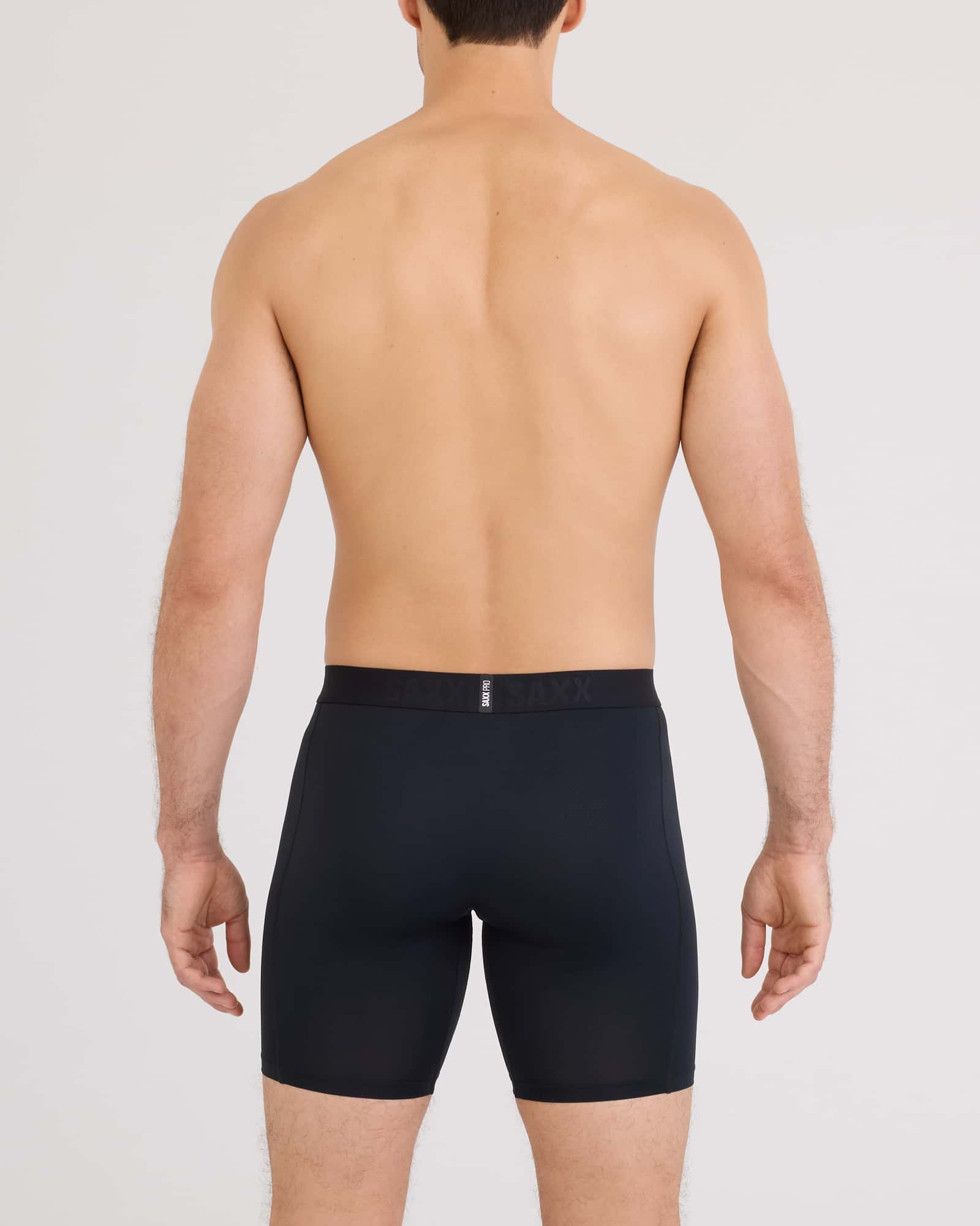 Back - Model wearing Smooth Flex Light Compression Long Boxer Brief in Black