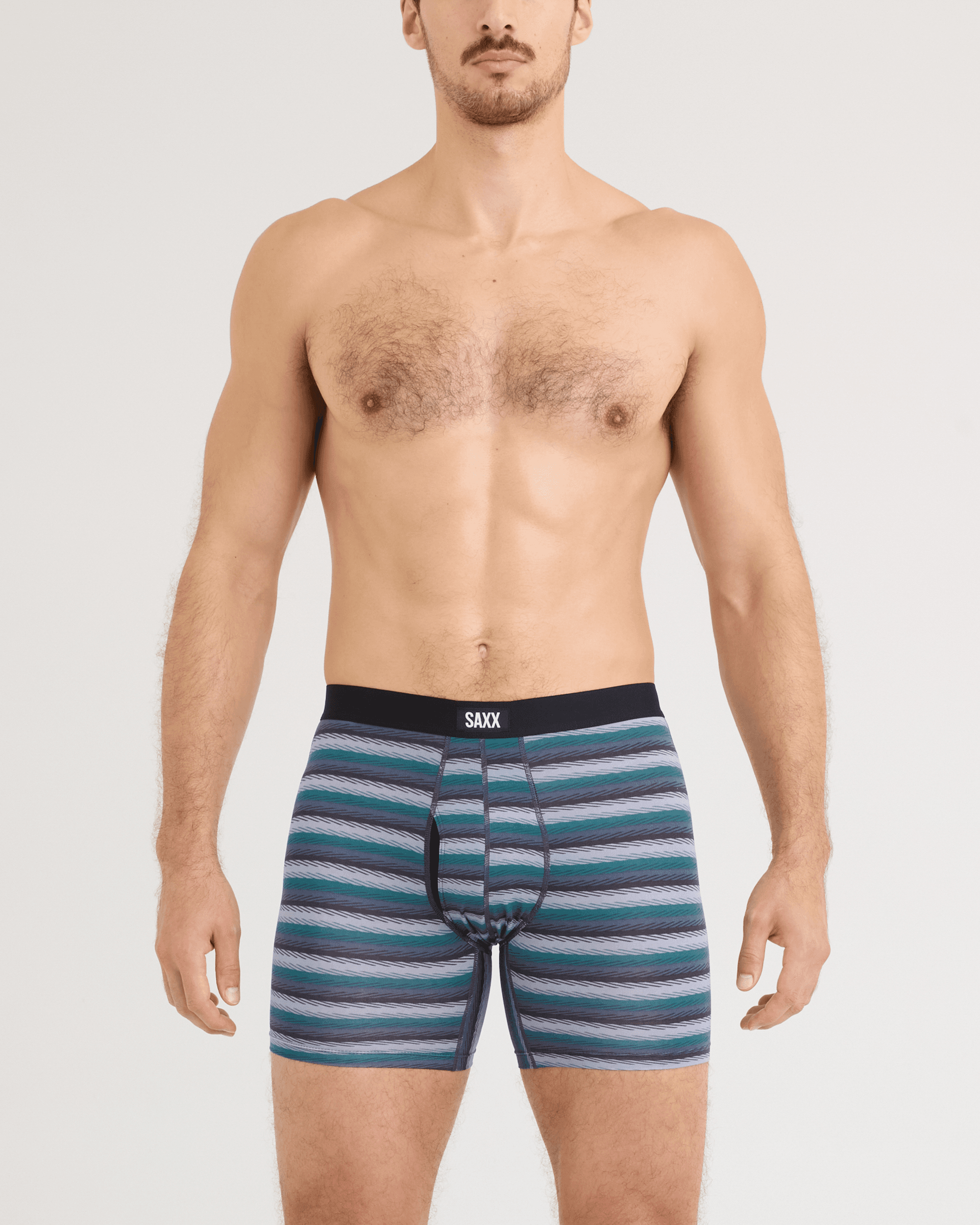 Back - Model wearing Daytripper Comfort Stretch Boxer Brief 3 Pack in Golf Sweater/Simple Stripe/Dark Ink