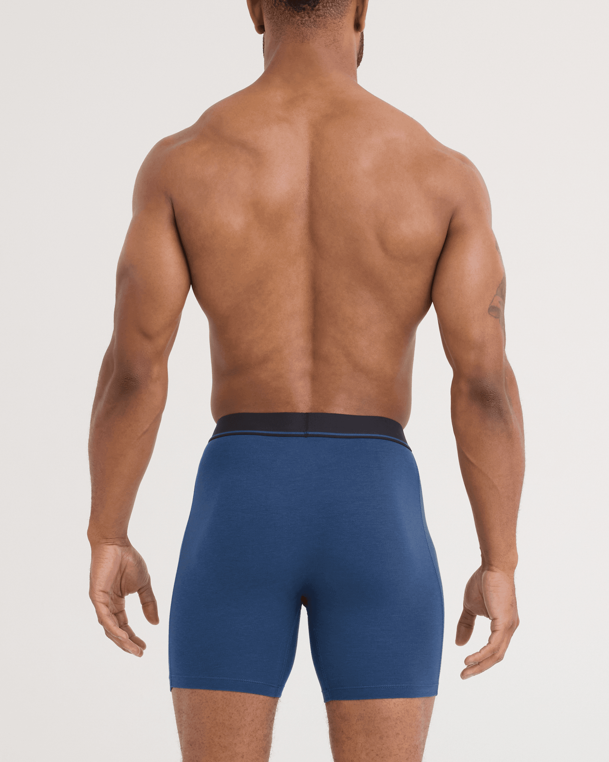 Back - Model wearing Essential Cotton Boxer Brief in Dark Denim