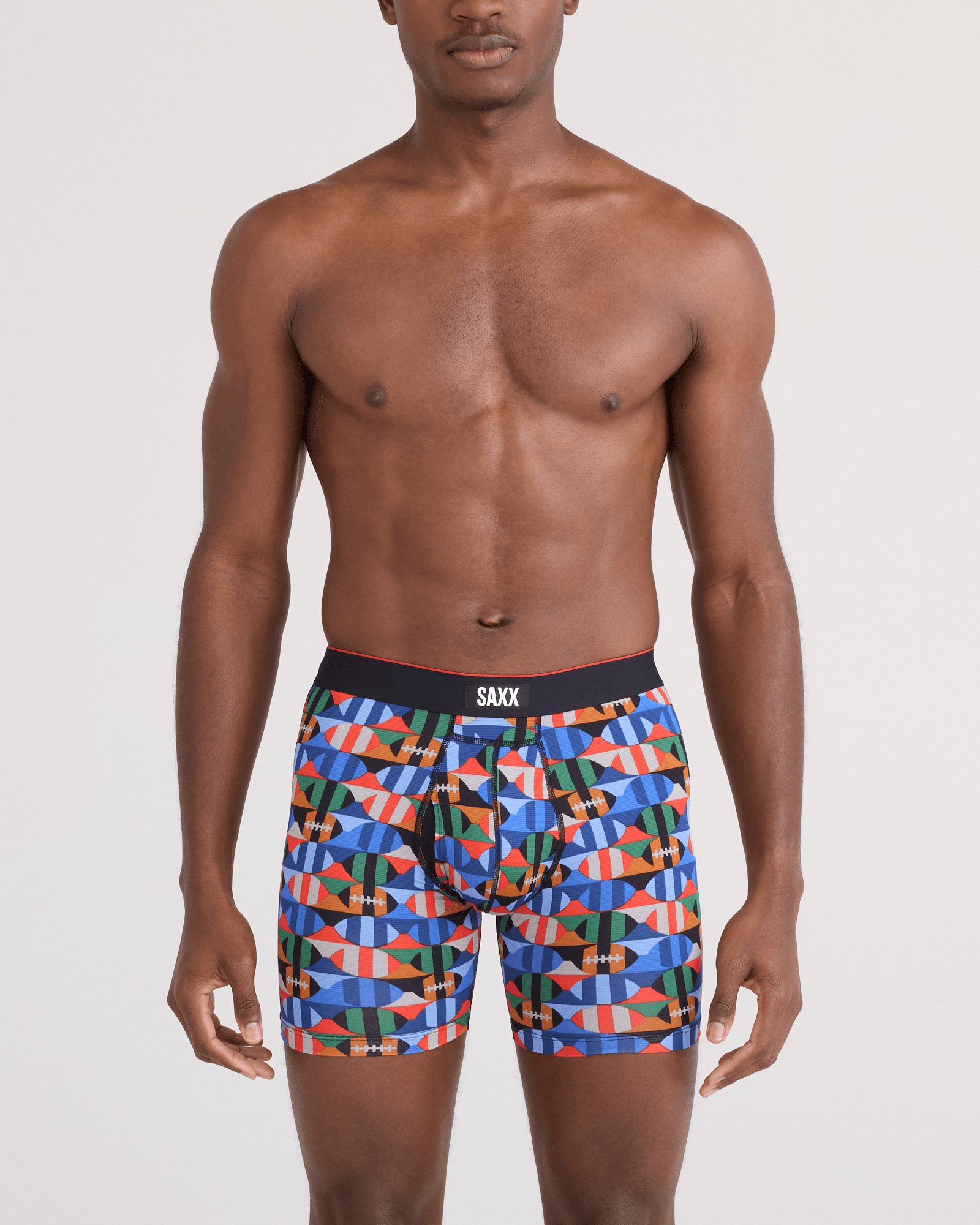 Front - Model wearing Multi-Sport Mesh Boxer Brief Fly in Gridiron Check-Multi
