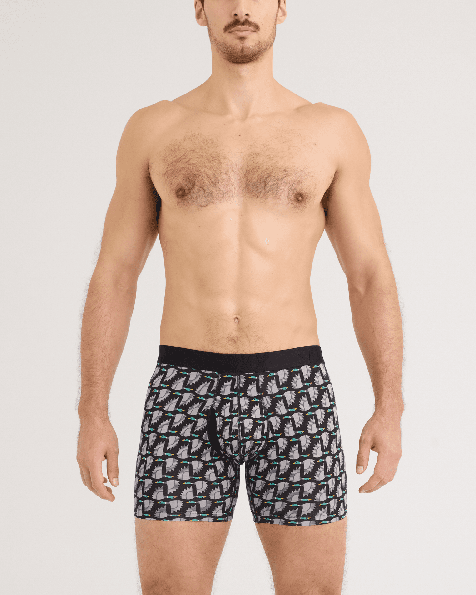 Front - Model wearing DropTemp Cooling Cotton Boxer Brief in Flight Pattern-Black