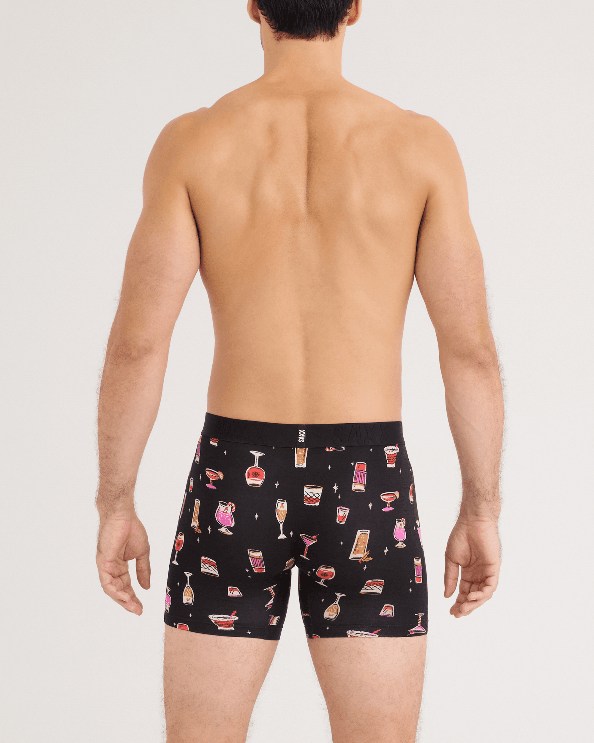 Back - Model wearing DropTemp Cooling Cotton Boxer Brief 2 Pack in Jingle Juice/Jingle Stripe