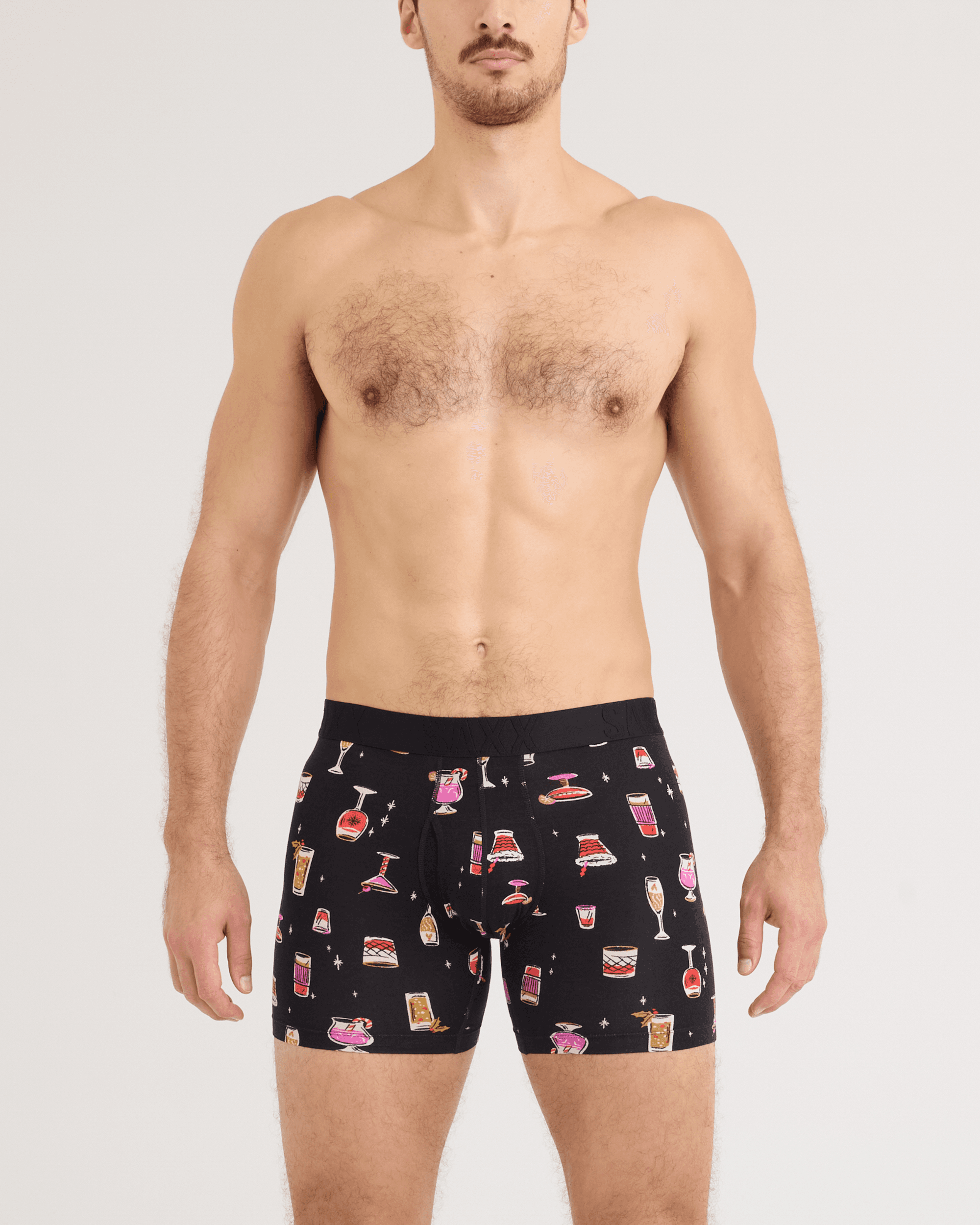 Front - Model wearing DropTemp Cooling Cotton Boxer Brief 2 Pack in Jingle Juice/Jingle Stripe