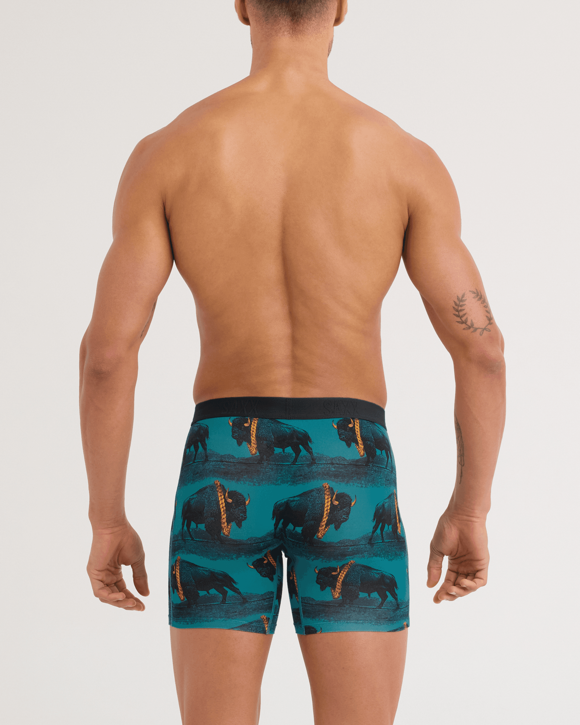 Back - Model wearing Vibe Xtra Soft Comfort Boxer Brief in Bison Bling-Seascape