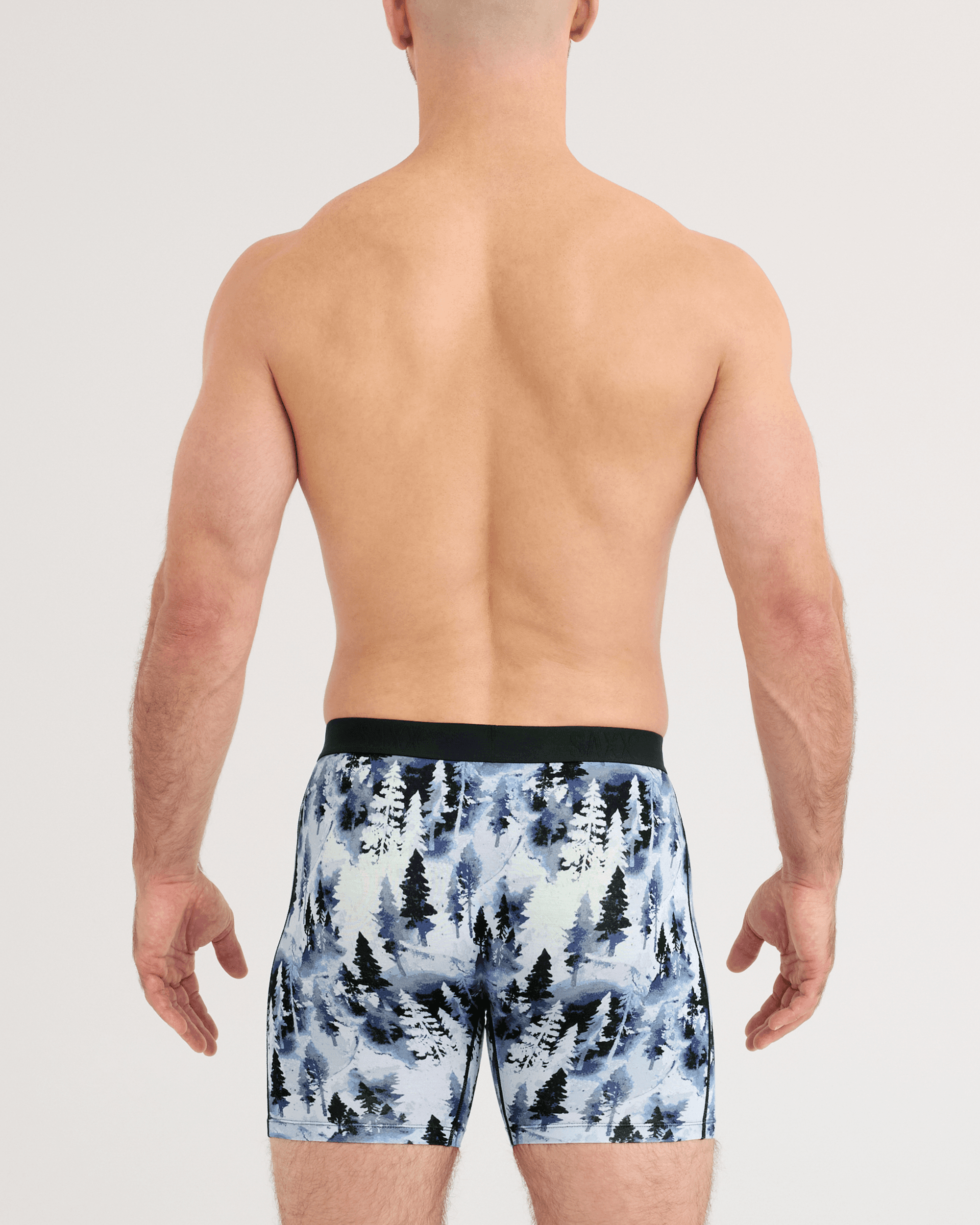 Back - Model wearing Vibe Xtra Soft Comfort Boxer Brief in Forestland-Midnight Blue