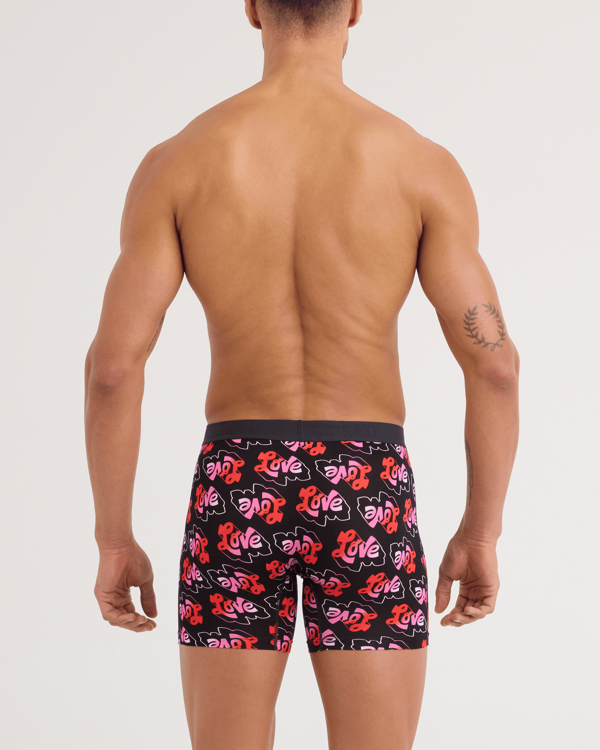 Back - Model wearing Vibe Xtra Soft Comfort Boxer Brief in Love Mark-Black