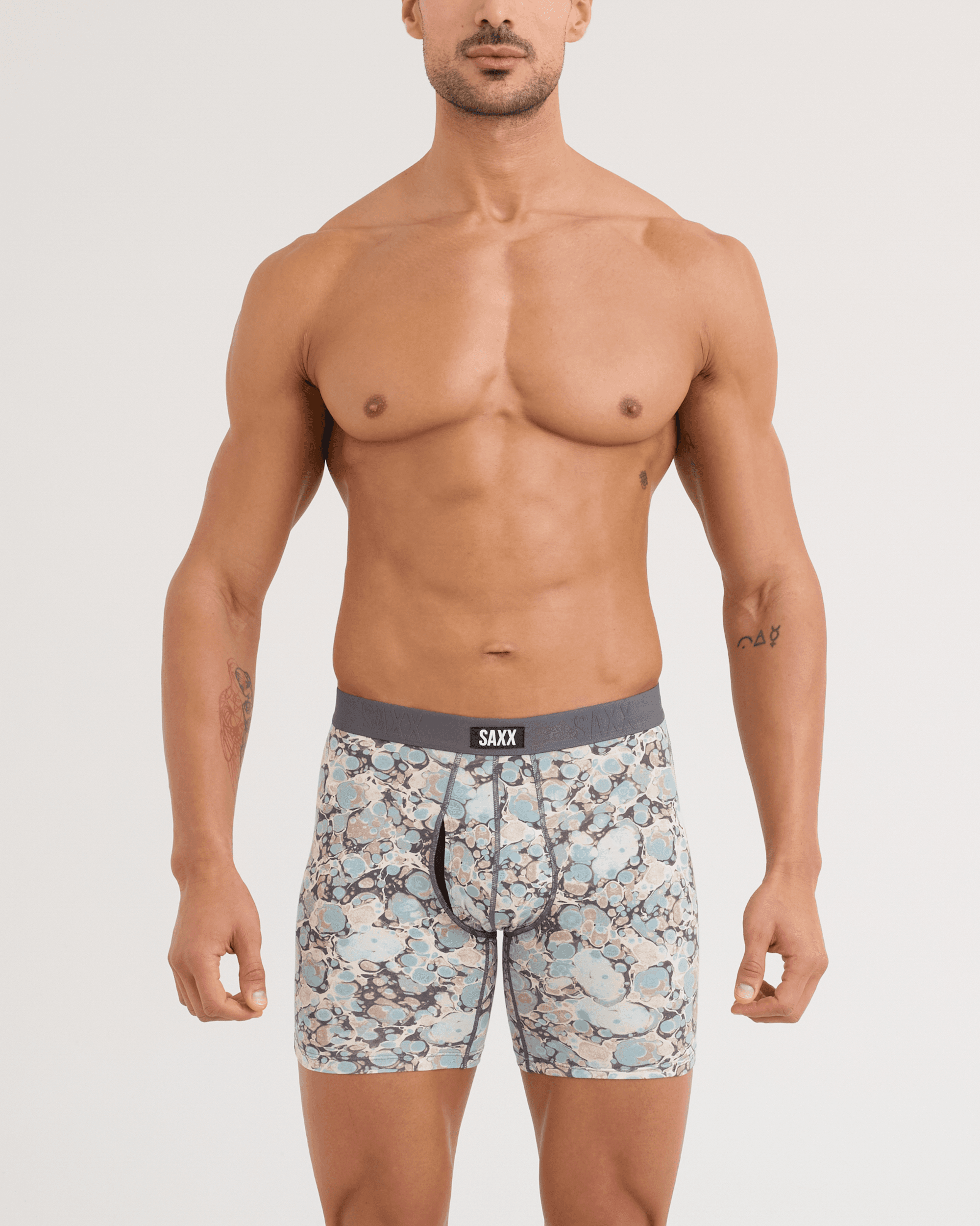Front - Model wearing Vibe Xtra Soft Comfort Boxer Brief in Marble Camo-Clay Blue