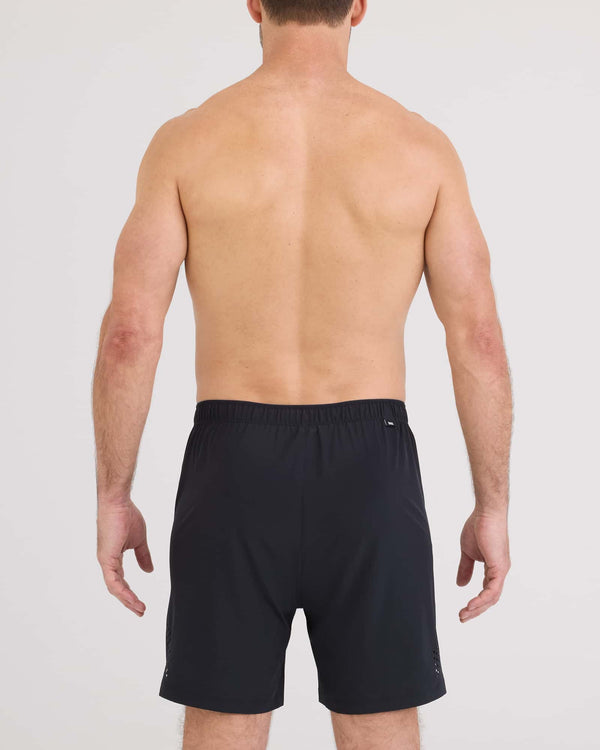 Back - Model wearing Power Moves 2N1 Short 7" in Black