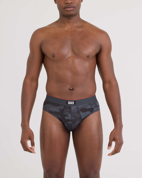 Front - Model wearing Multi-Sport Mesh Brief in Remote Camo - Faded Black