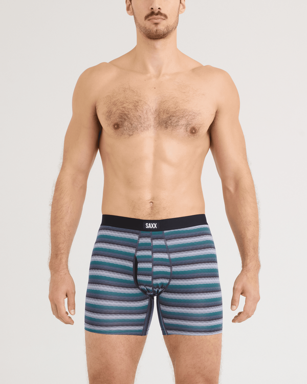 Back - Model wearing Daytripper Comfort Stretch Boxer Brief 3 Pack in Golf Sweater/Simple Stripe/Dark Ink