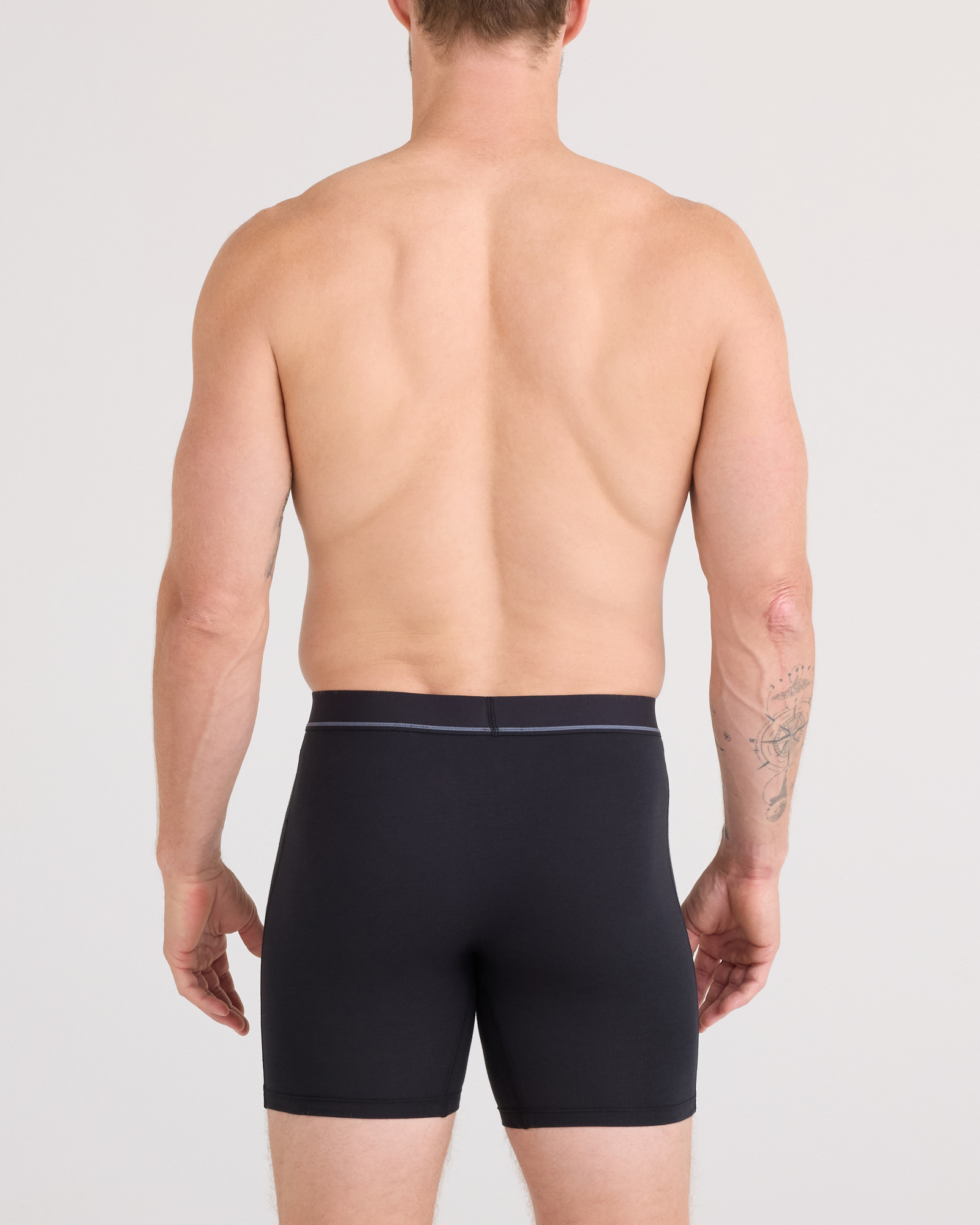 Back - Model posing in Essential Cotton Boxer Brief in Black