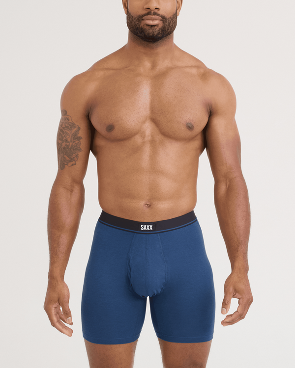 Front - Model wearing Essential Cotton Boxer Brief in Dark Denim