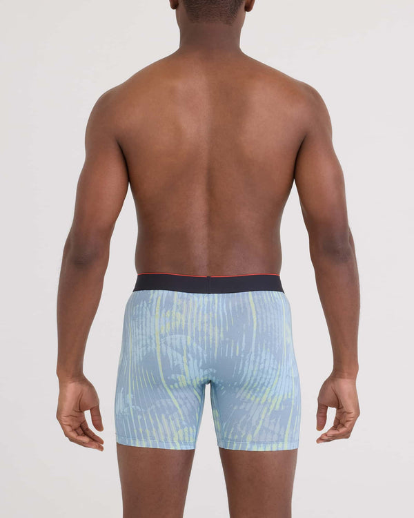 Back - Model wearing Multi-Sport Mesh Boxer Brief Fly in Palm Screen-Faded Denim