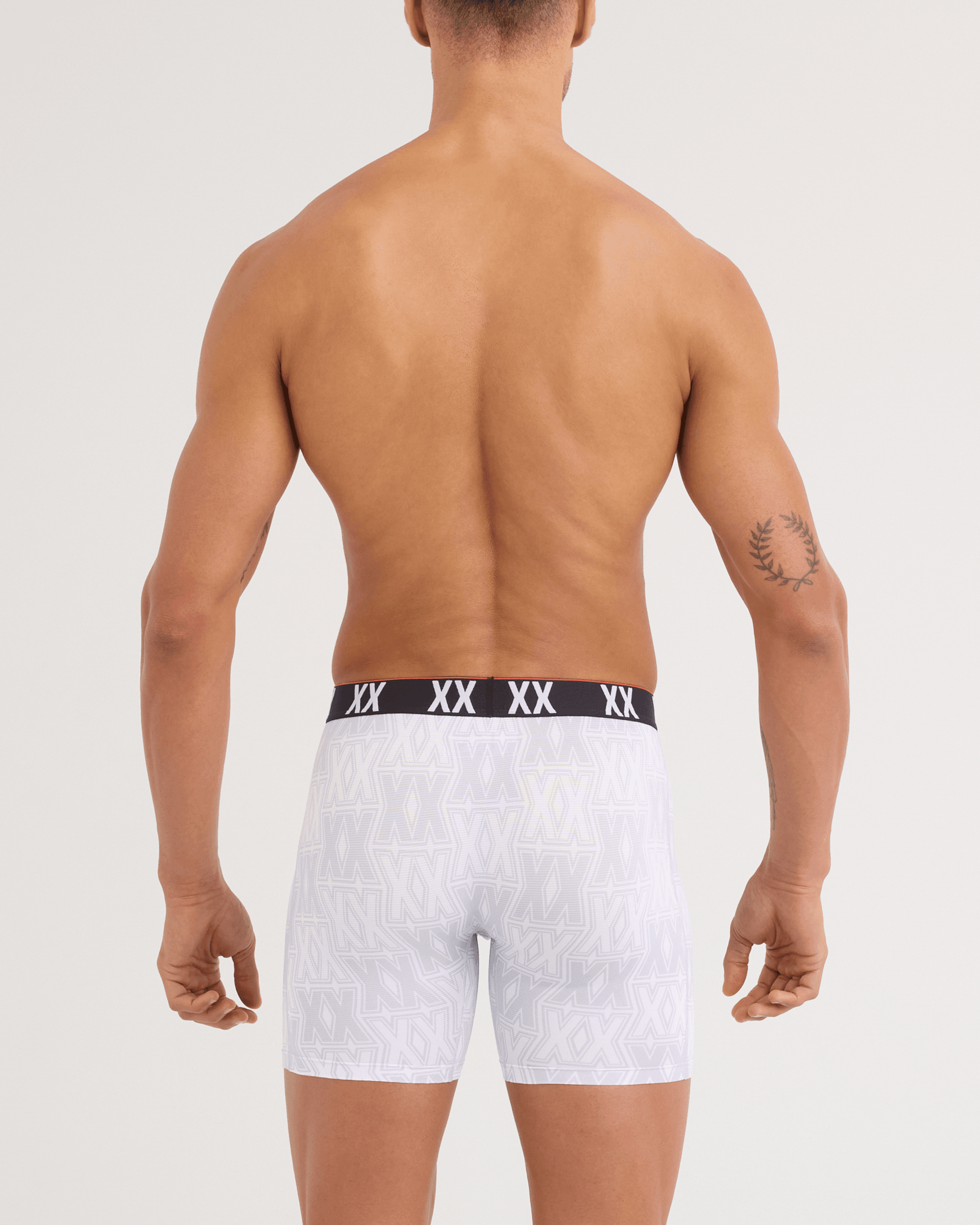 Back - Model wearing Multi-Sport Mesh Boxer Brief 3 Pack in XXcellence/Tradewinds/Black