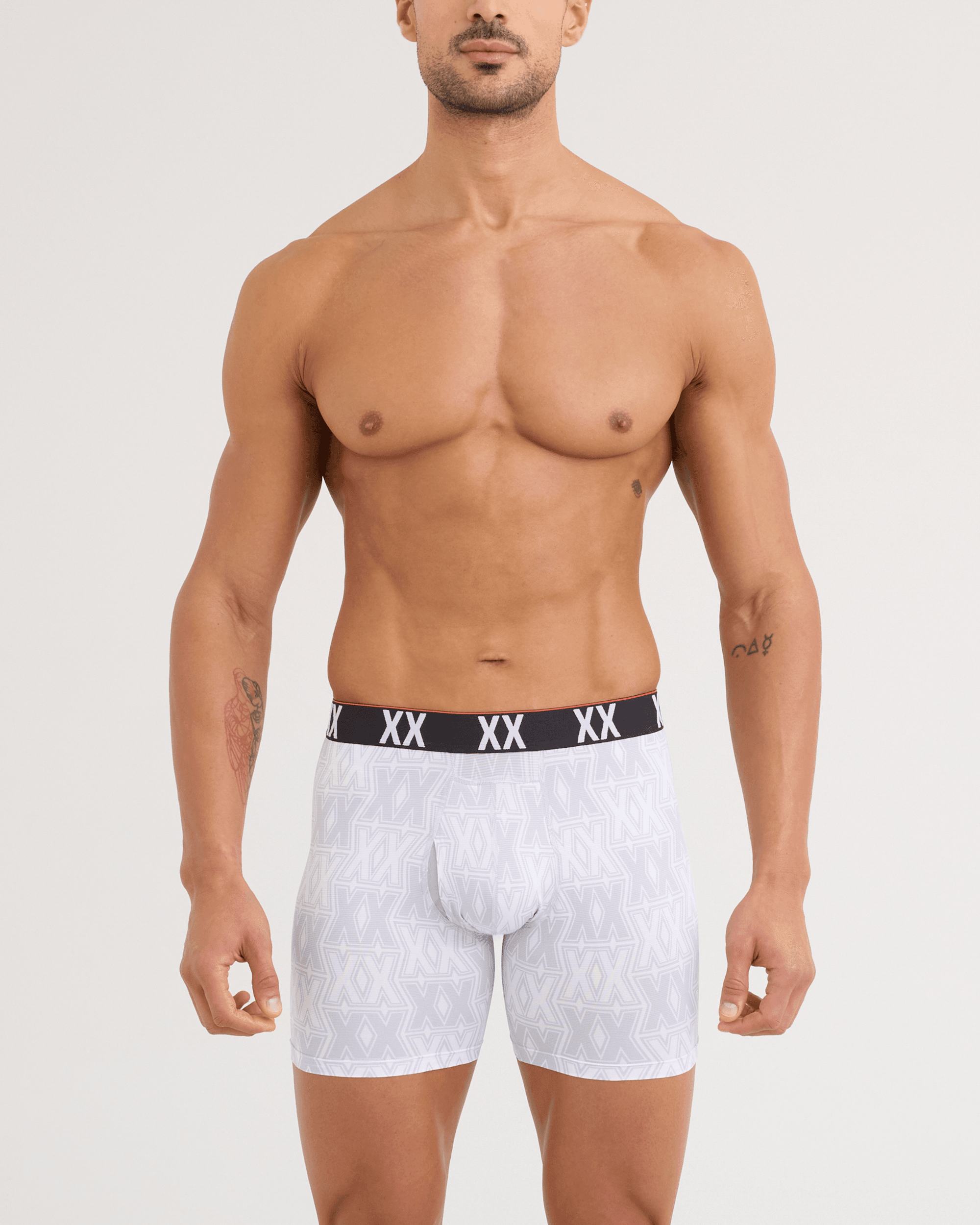 Front - Model wearing Multi-Sport Mesh Boxer Brief 3 Pack in XXcellence/Tradewinds/Black