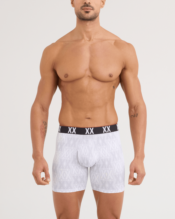 Front - Model wearing Multi-Sport Mesh Boxer Brief 3 Pack in XXcellence/Tradewinds/Black