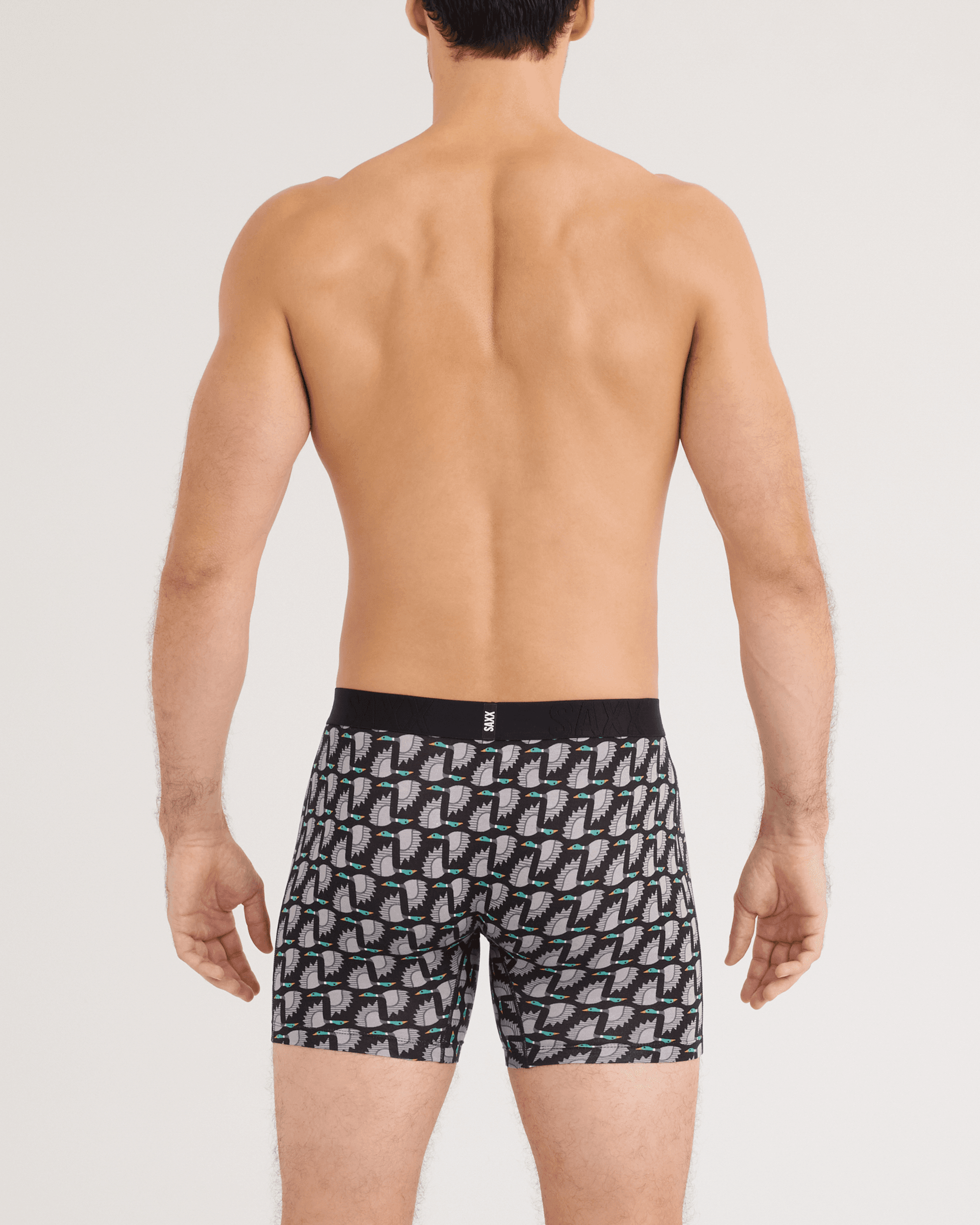 Back - Model wearing DropTemp Cooling Cotton Boxer Brief in Flight Pattern-Black