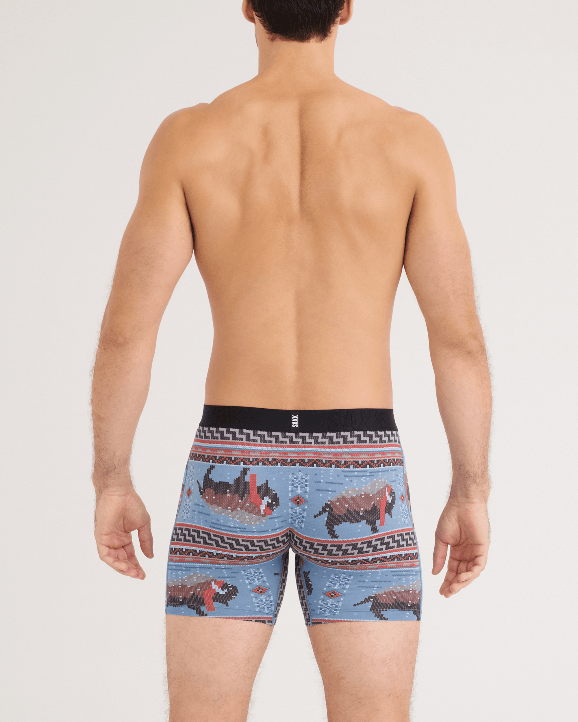 Back - Model wearing DropTemp Cooling Cotton Boxer Brief in Fluffalo-Washed Blue