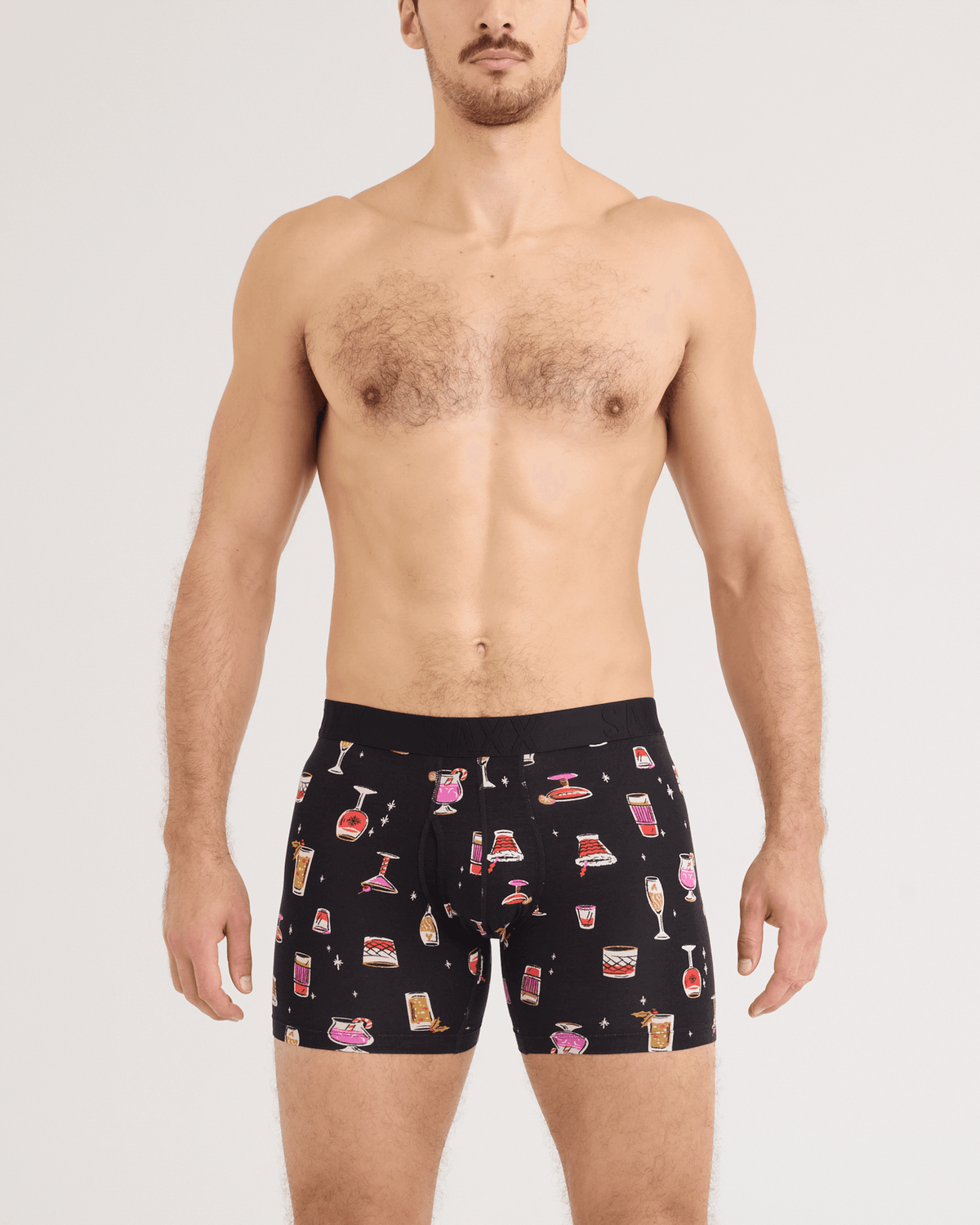 Front - Model wearing DropTemp Cooling Cotton Boxer Brief 2 Pack in Jingle Juice/Jingle Stripe