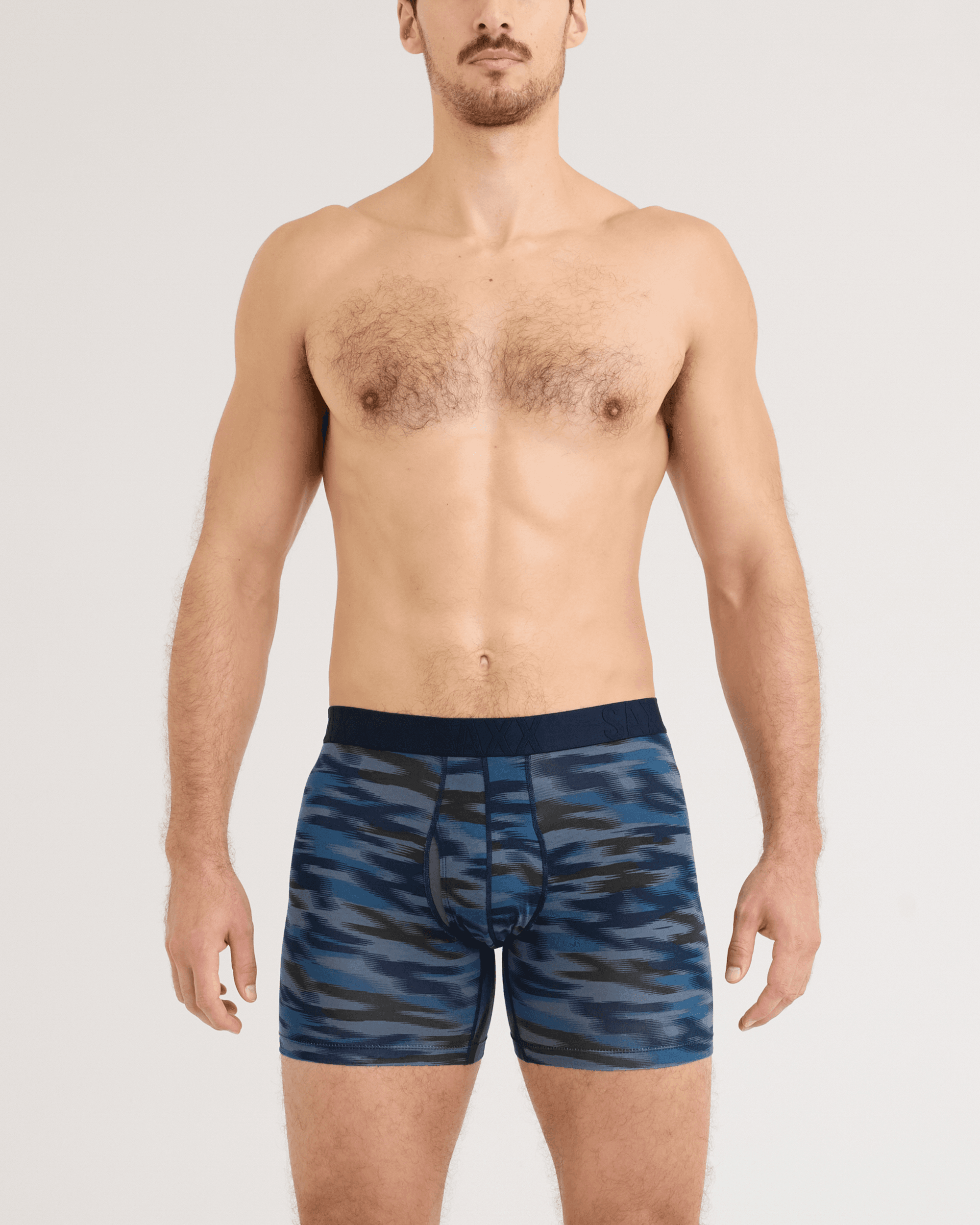 Front - Model wearing DropTemp Cooling Cotton Boxer Brief in Swift Camo-Dark Ink