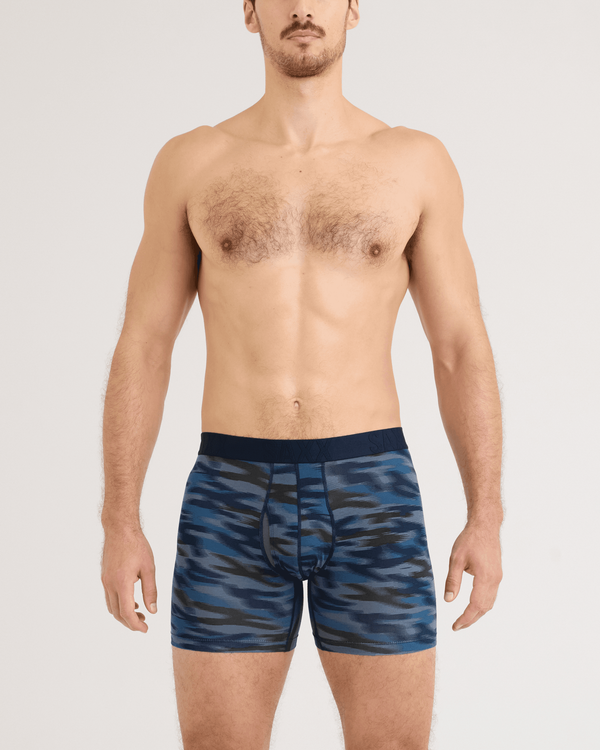 Front - Model wearing DropTemp Cooling Cotton Boxer Brief in Swift Camo-Dark Ink