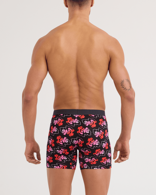 Back - Model wearing Vibe Xtra Soft Comfort Boxer Brief in Love Mark-Black