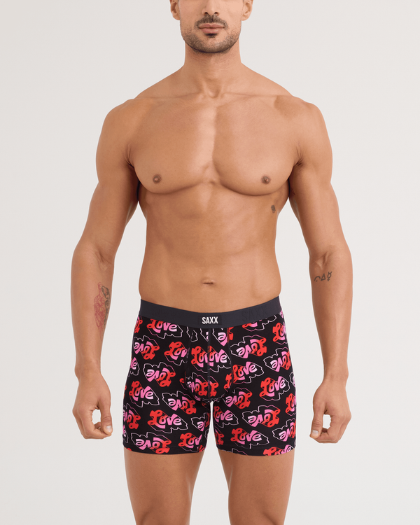 Front - Model wearing Vibe Xtra Soft Comfort Boxer Brief in Love Mark-Black