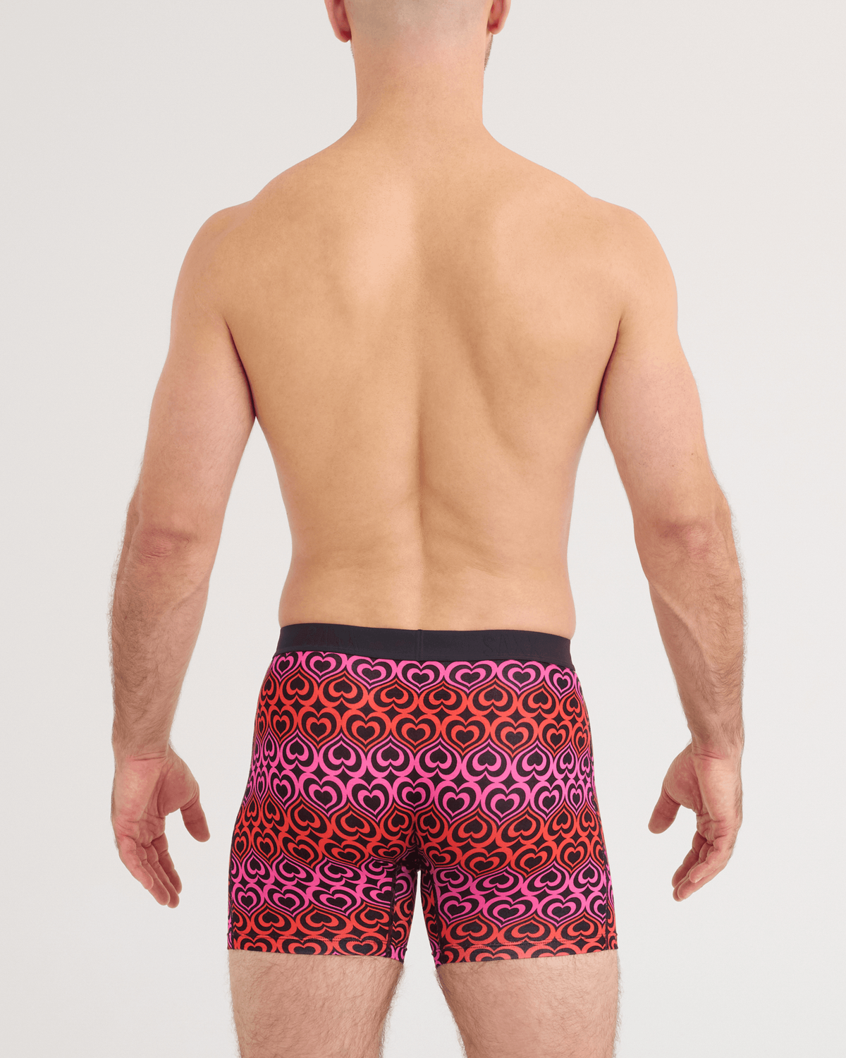Back - Model wearing Vibe Xtra Soft Comfort Boxer Brief in Love Stripe-Black