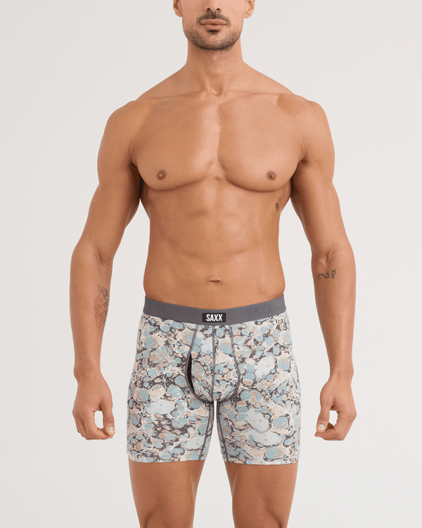 Front - Model wearing Vibe Xtra Soft Comfort Boxer Brief in Marble Camo-Clay Blue