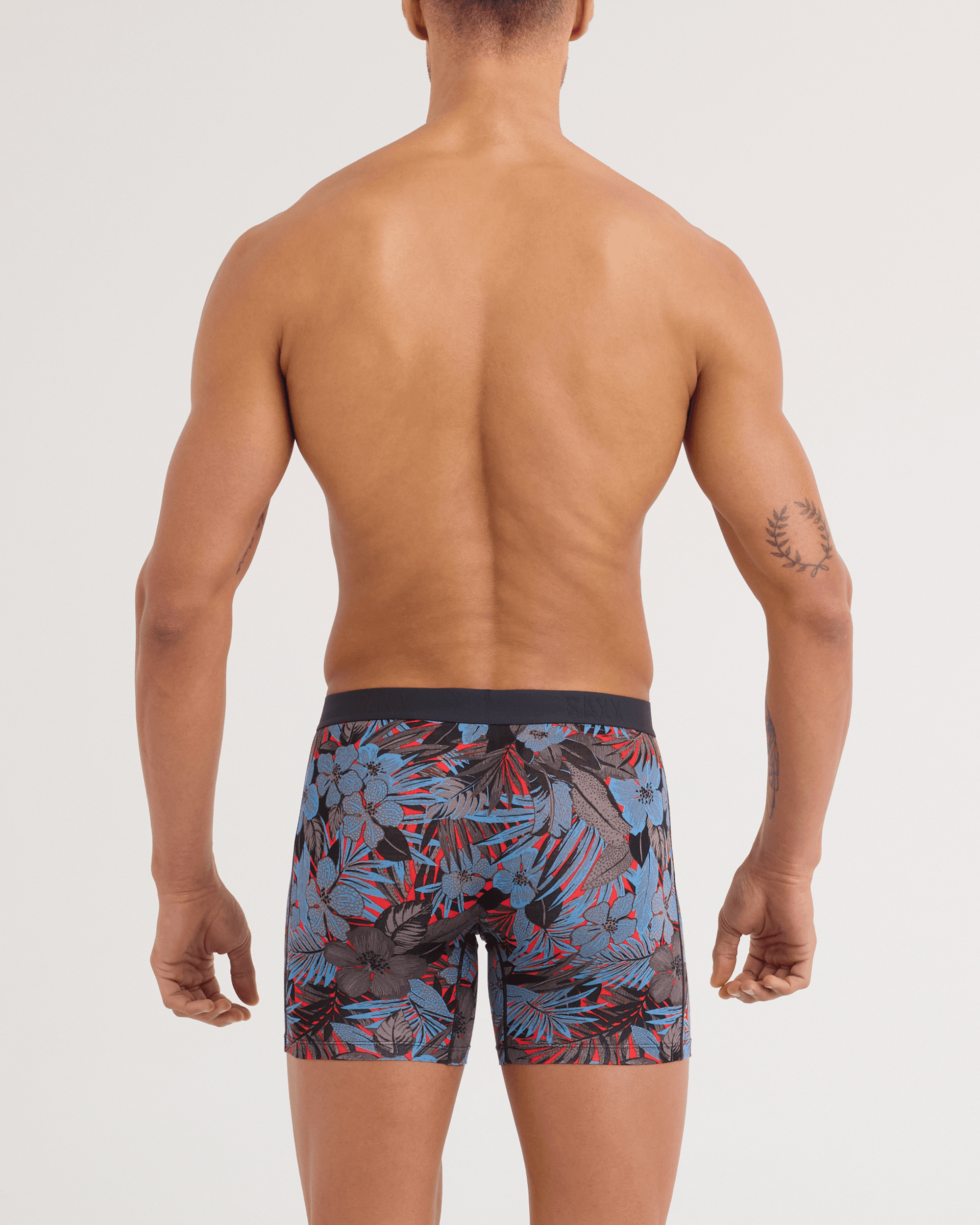 Back - Model wearing Vibe Xtra Soft Comfort Boxer Brief in Night Garden-Red Hot