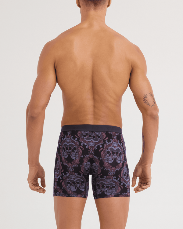 Back - Model wearing Vibe Xtra Soft Comfort Boxer Brief in Skull Brocade-Black